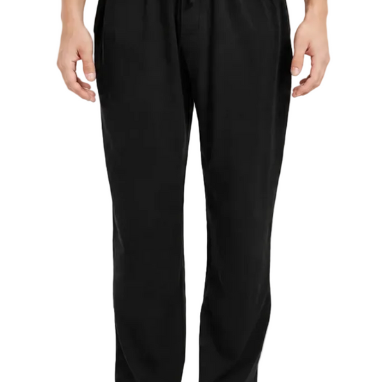 Black drawstring lounge pants worn by a model, shown from the waist down against a plain white background.